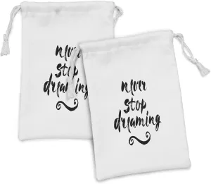 Ambesonne Lettering Fabric Pouch Set of 2, Never Stop Dreaming Message Written in Murky Grunge Tones Psychological, Small Drawstring Bag for Toiletries Masks and Favors, 9" x 6", Charcoal Grey White