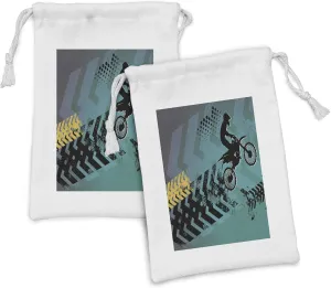 Lunarable Dirt Bike Fabric Pouch Set of 2, Extreme Sports Theme Stunt Racer Silhouette Grunge Arrows, Small Drawstring Bag for Toiletries Masks and Favors, 9" x 6", Teal Pale Blue and Black