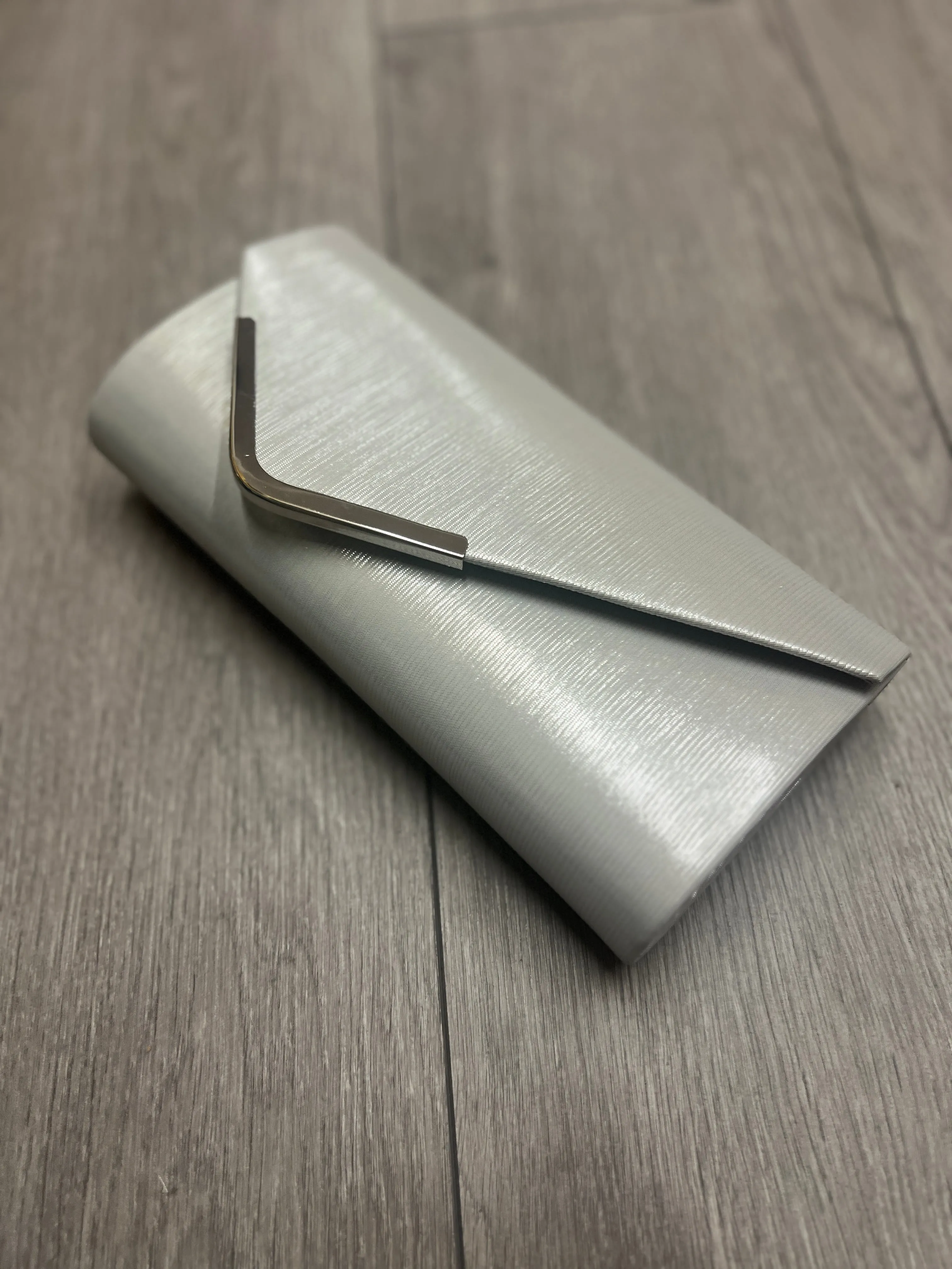 Metallic Clutch Bag With Silver Trim- Silver