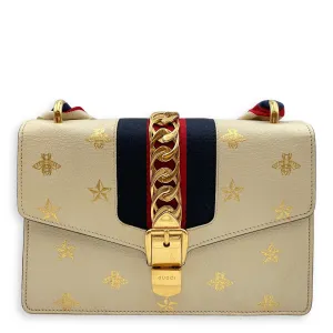 Sylvie Bee Star Print Beige Crossbody Bag in Calfskin, Gold hardware